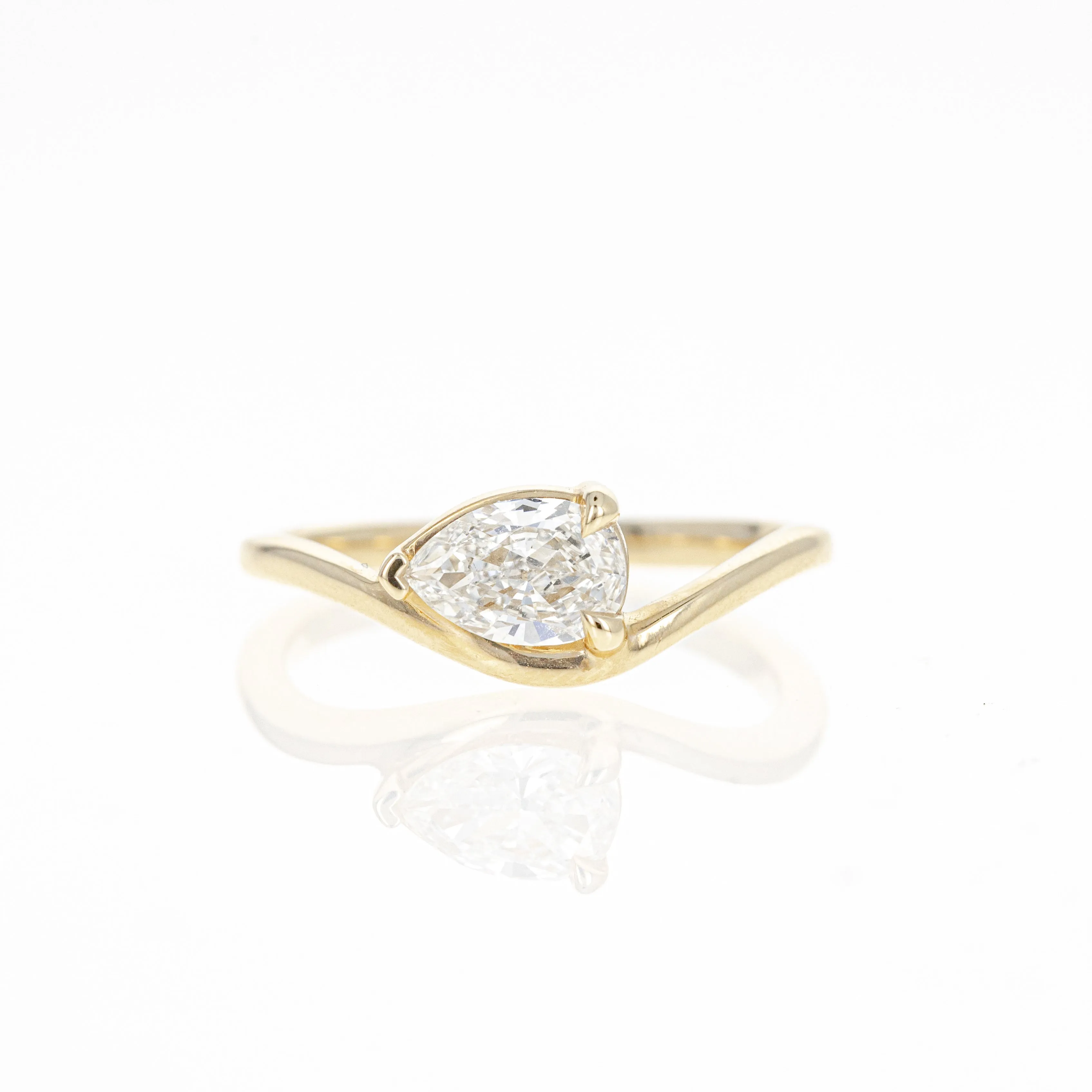 0.64 Carat East-West Pear Diamond Ring