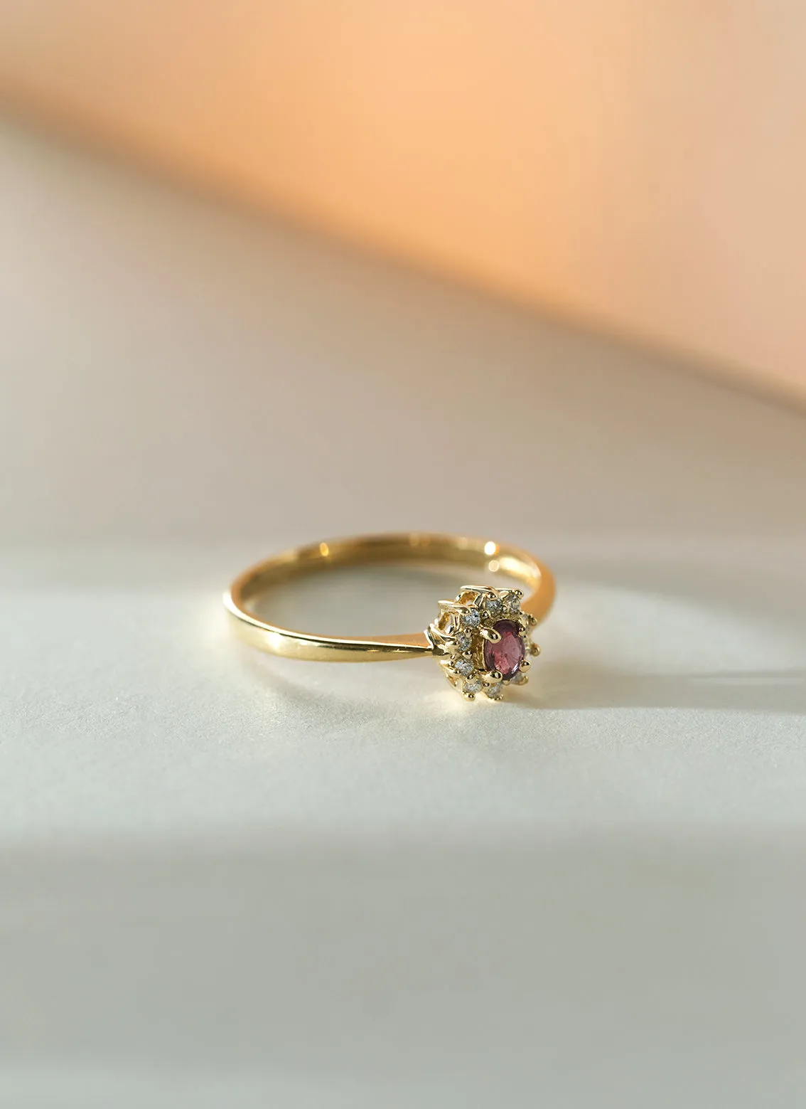 Triss halo diamond pink tourmaline ring 14k gold